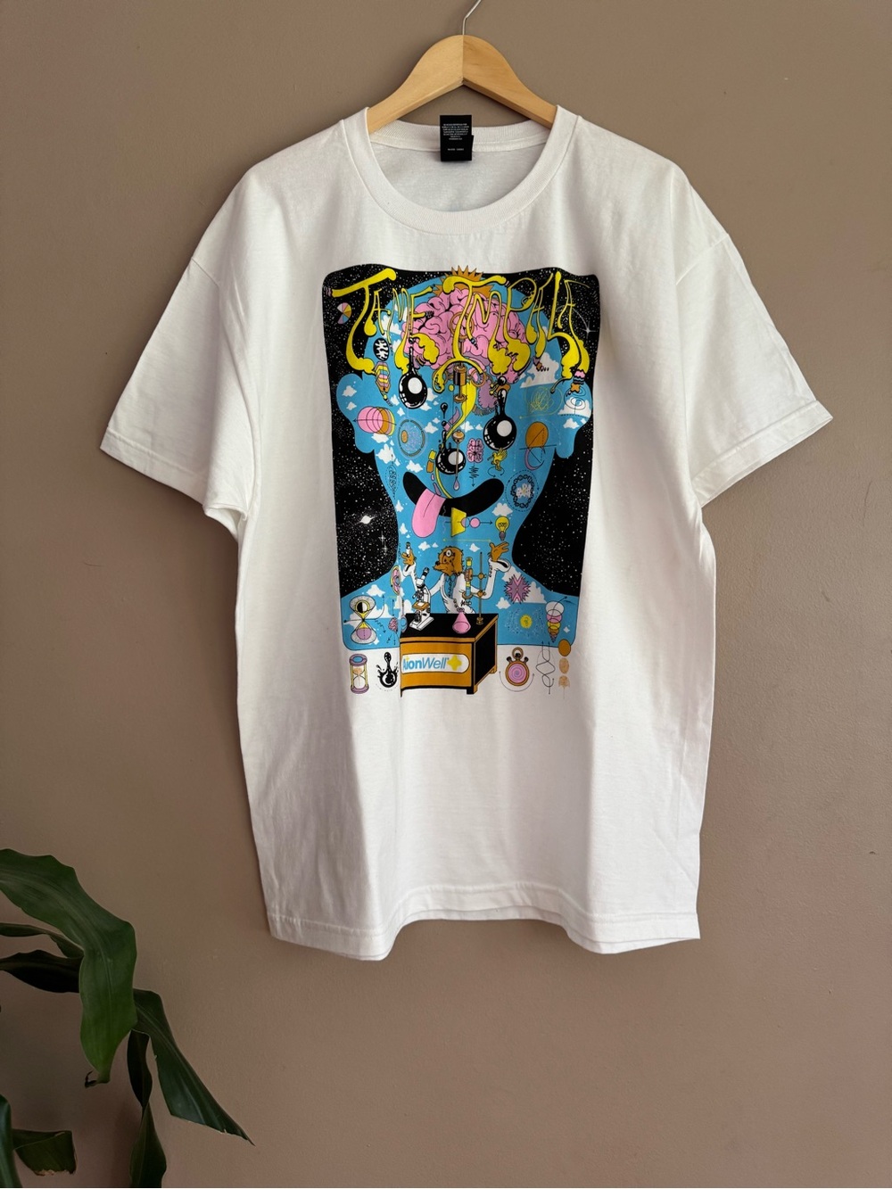 White Tame Impala 'Blomerth' T-Shirt featuring a psychedelic graphic by artist